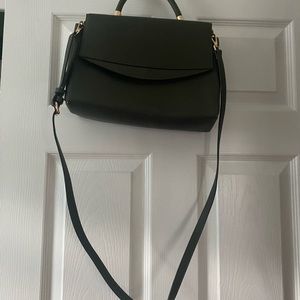 On my way … forest green hand bag